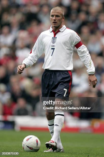 David Beckham of England on the ball during the Group Six World Cup Qualifier, match between England and Wales at Old Trafford on October 9, 2004 in...
