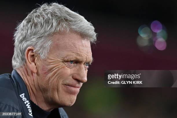 West Ham United's Scottish manager David Moyes reacts as bubbles are blown ahead of play in the English Premier League football match between West...
