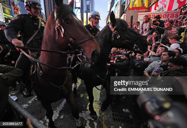 Mounted police stop Occupy Wall Street participants trying to break trough police barricade set stop them to take their demonstration onto the street...