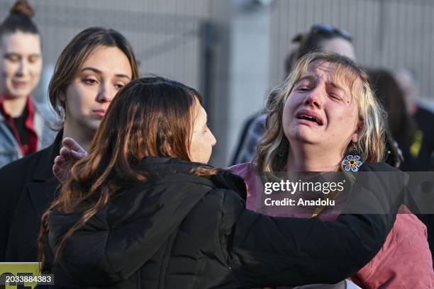 Woman cries as hundreds of people, including Jews, gather in front of the Israeli Embassy to collectively mourn the US airman Aaron Bushnell an...