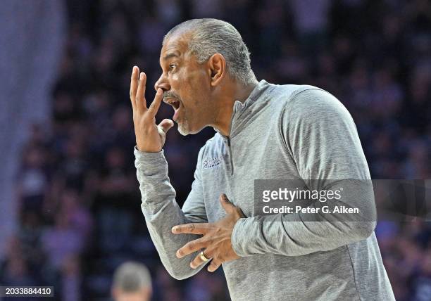 Head coach Jerome Tang of the Kansas State Wildcats calls out instructions in overtime against the West Virginia Mountaineers at Bramlage Coliseum on...