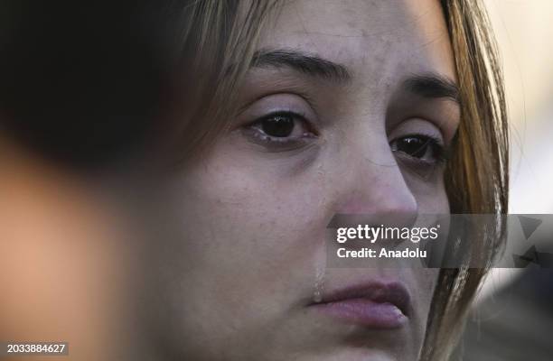 Woman cries as hundreds of people, including Jews, gather in front of the Israeli Embassy to collectively mourn the US airman Aaron Bushnell an...