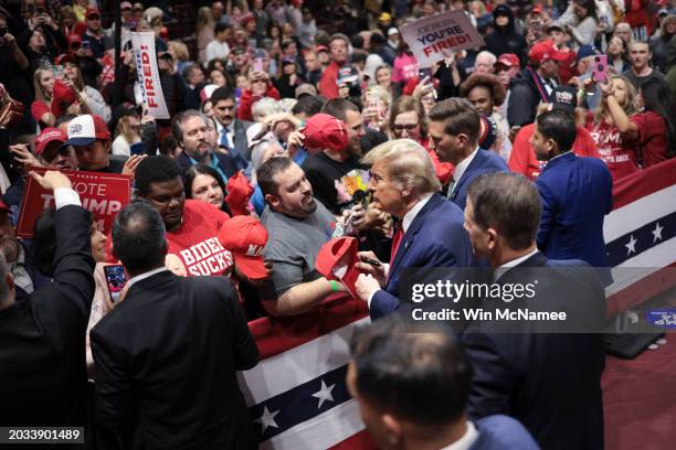 Republican presidential candidate and former President Donald Trump greets supporters after speaking at a Get Out The Vote rally at Winthrop...