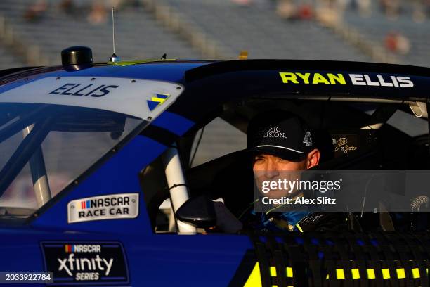 Ryan Ellis, driver of the Classic Collision Chevrolet, looks on in his car during qualifying for the NASCAR Xfinity Series King of Tough 250 at...