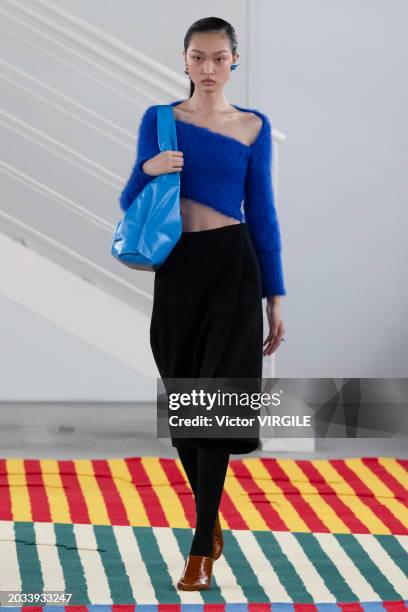 Model walks the runway during the Sunnei Ready to Wear Fall/Winter 2024-2025 fashion show as part of the Milan Fashion Week on February 23, 2024 in...