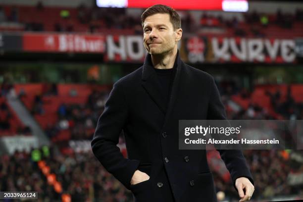 Xabi Alonso, Head Coach of Bayer Leverkusen, looks on prior to the Bundesliga match between Bayer 04 Leverkusen and 1. FSV Mainz 05 at BayArena on...