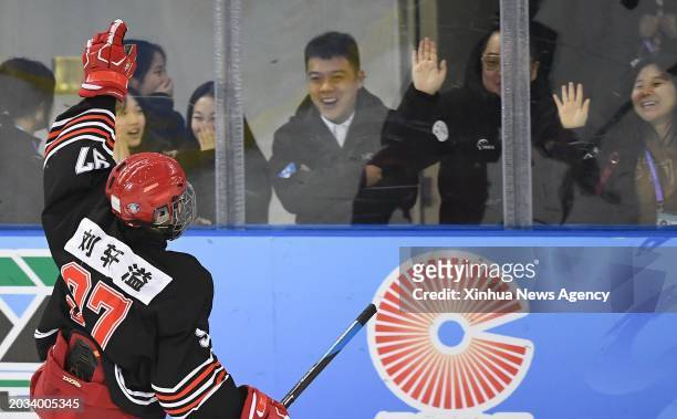 Liu Xuanyi of Heilongjiang celebrates after scoring a goal during the junior men's ice hockey semifinal match between Heilongjiang and Shaanxi at the...
