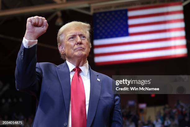 Republican presidential candidate and former President Donald Trump gestures to supporters after speaking at a Get Out The Vote rally at Winthrop...