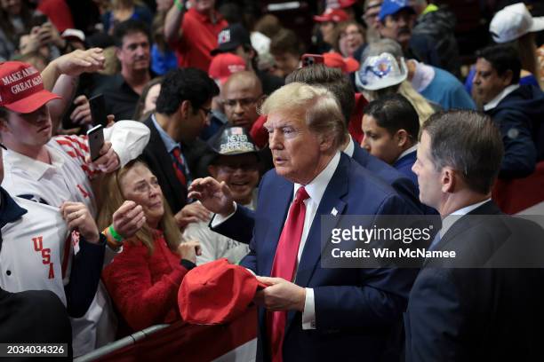 Republican presidential candidate and former President Donald Trump greets supporters after speaking at a Get Out The Vote rally at Winthrop...