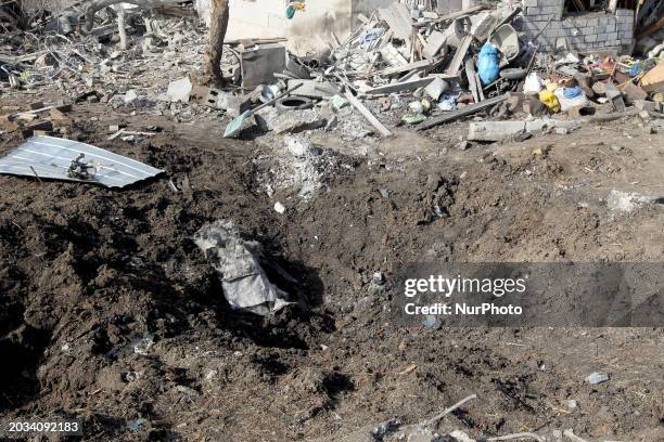Crater is pictured after the Russian missile attack in Dnipro, Ukraine, on February 26, 2024. Two women are reported to have sustained injuries and...