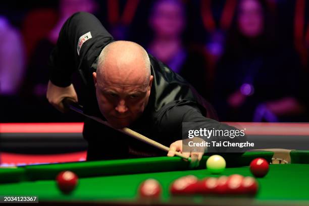 John Higgins of Scotland plays a shot in the Quarter-final match against Zhang Anda of China on day five of 2024 Players Championship at Telford...