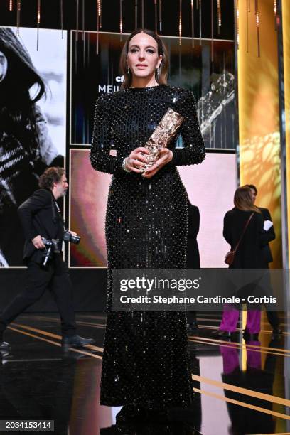 Monia Chokri poses on stage with the 'Best Foreign Film' Cesar Award for the movie 'Simple comme Sylvain' during the 49th Cesar Film Awards at...