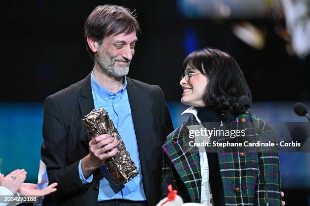 Sébastien Laudenbach and Chiara Malta accept the 'Best Animation Feature' Cesar Award for the movie 'Linda veut du poulet' on stage during the 49th...