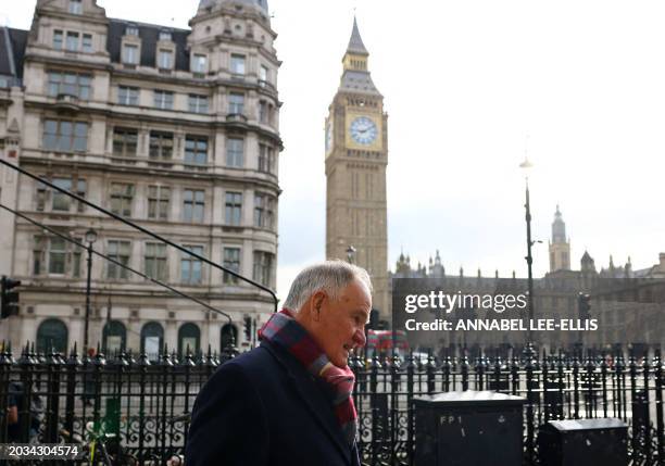 Former Post Office CEO Henry Staunton passes the Elizabeth Tower of the Houses of Parliament, commonly refered to as 'Big Ben' after the tower's...