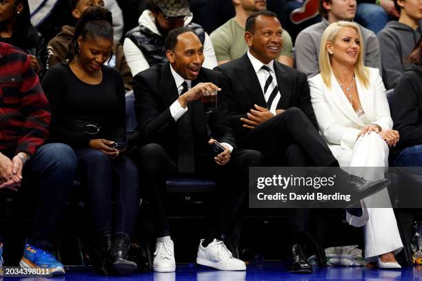 Analyst Stephen A. Smith interacts with co-owner Alex Rodriguez of the Minnesota Timberwolves in the first quarter of the game against the Milwaukee...