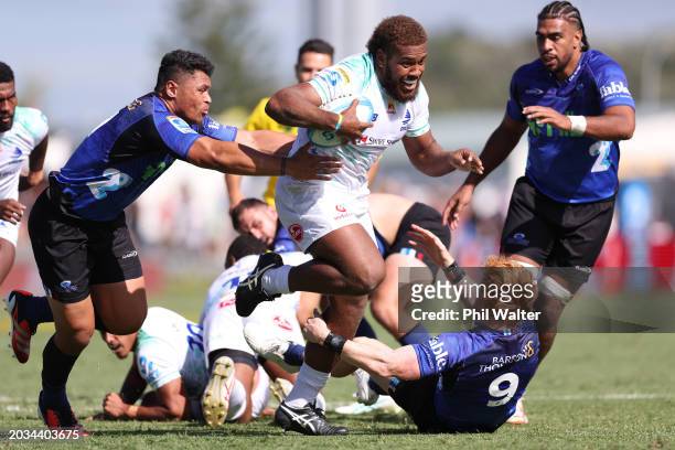 Tevita Ikanivere of Fiji Drua makes a break during the round one Super Rugby Pacific match between the Blues and Fijian Drua at Semenoff Stadium, on...