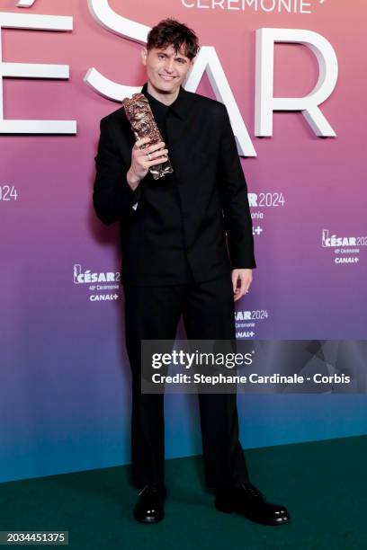 Raphael Quenard poses in the winners room with the 'Best Male Newcomer' Cesar Award for the movie 'Chien de la casse' during the 49th Cesar Film...