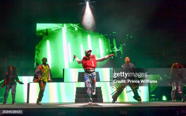 Chris Brown performs during Tycoon Music Festival at State Farm Arena on February 13, 2024 in Atlanta, Georgia.