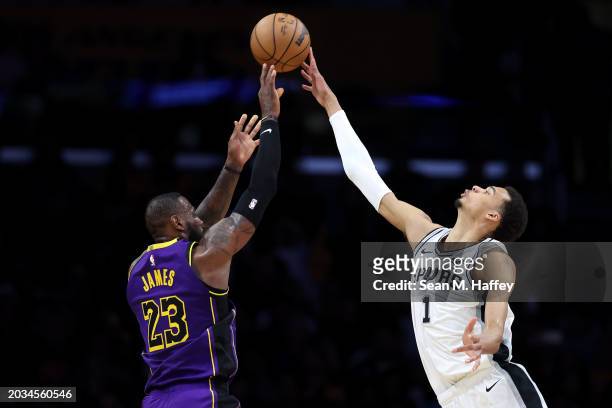 Victor Wembanyama of the San Antonio Spurs blocks a shot by LeBron James of the Los Angeles Lakers during the second half of a game at Crypto.com...