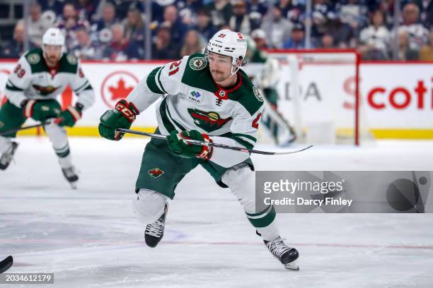 Brandon Duhaime of the Minnesota Wild follows the play down the ice during third period action against the Winnipeg Jets at the Canada Life Centre on...