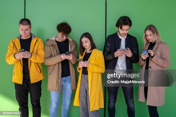 millennial generation modern devices technology - wealth creation stock pictures, royalty-free photos & images