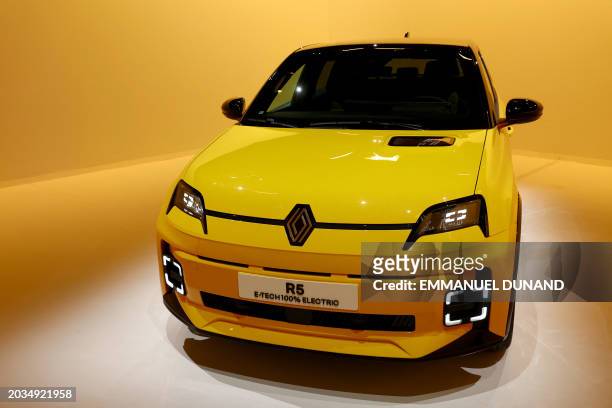 This photograph taken on February 12 shows a Renault 5 E-TECH Electric during a press preview in the Paris suburb of Aubervilliers before it is...