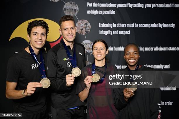 Belgium's Jonathan Sacoor, Dylan Borlee, Camille Laus and Cynthia Bolingo Mbongo pose during a press conference to present the 'Projet Teams 4x400m...