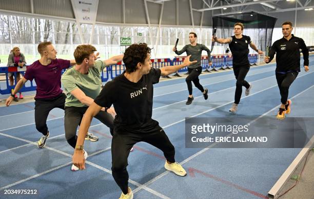 Athletes hold a training session after a press conference to present the 'Projet Teams 4x400m Paris 2024', Tuesday 27 February 2024 in...
