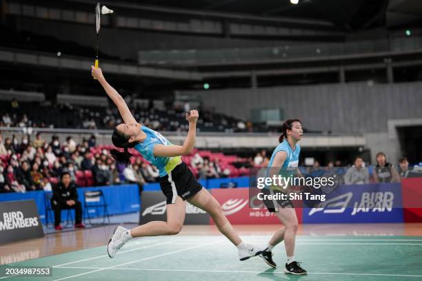 Kie Nakanishi and Arisa Higashino of Team Biprogy compete in the Women's Doubles match against Nami Matsuyama and Chiharu Shida of Team Saishunkan in...