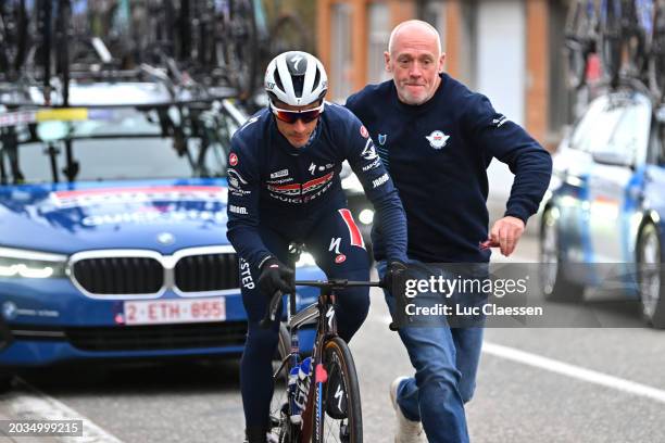 Julian Alaphilippe of France and Team Soudal Quick-Step with mechanical problems is helped by Tom Steels of Belgium Sports Director during the 79th...
