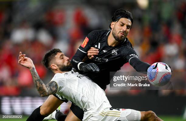 James Delianov goalkeeper of Adelaide United saves over Brandon Borello of the Wanderers during the A-League Men round 18 match between Adelaide...