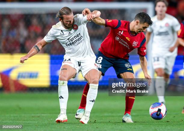 Jorrit Hendrix of the Wanderers competes with Isaias Sanchez of Adelaide United during the A-League Men round 18 match between Adelaide United and...