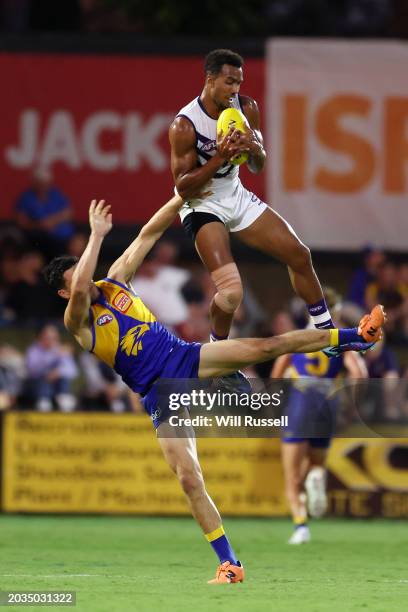 Brandon Walker of the Dockers takes an overhead mark during an AFL practice match between West Coast Eagles and Fremantle Dockers at Mineral...