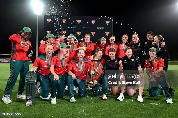Tigers players celebrate the win during the WNCL match between Tasmania and Queensland at Blundstone Arena, on February 24 in Hobart, Australia.