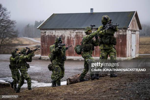 Soldiers from the 13th counter intelligence battalion, 2nd reconnaissance platoon of the Swedish Armed Forces, participate in military exercise in...
