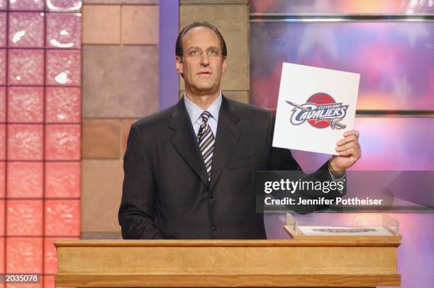 Deputy commissioner of the NBA Russ Granik holds a card with the Cleveland Cavaliers logo, meaning that the Cavaliers have the right to choose their...