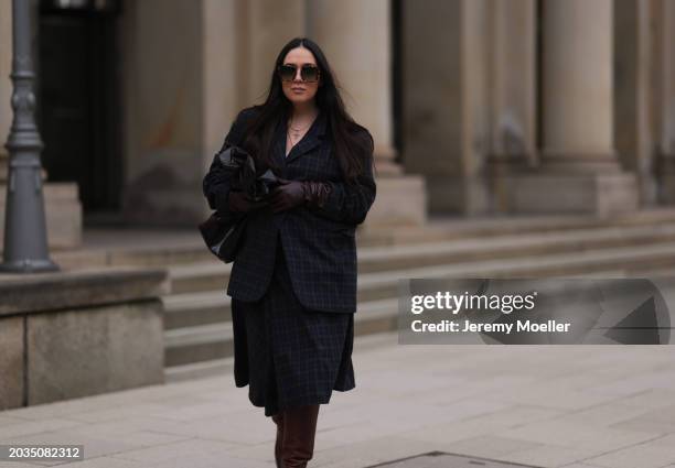 Jennifer Casimiro seen wearing Barton Perreira brown / black tortoise sunglasses, silver pendant necklace, Samsøe Samsøe navy blue / brown checked...