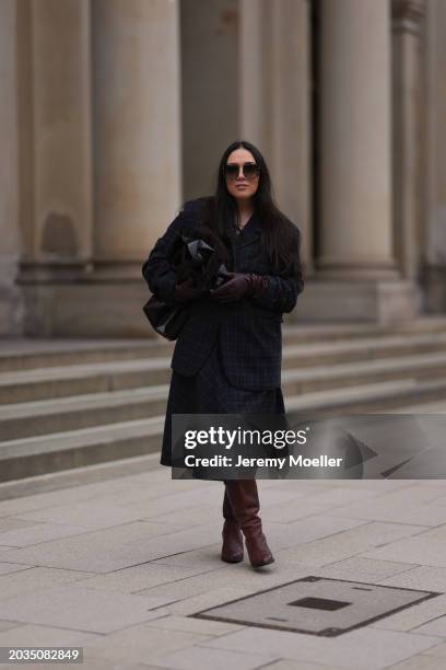 Jennifer Casimiro seen wearing Barton Perreira brown / black tortoise sunglasses, silver pendant necklace, Samsøe Samsøe navy blue / brown checked...