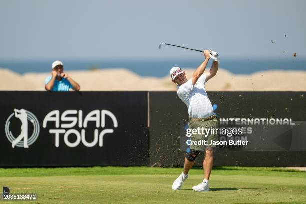 Louis Oosthuizen of South Africa tees off on hole 8 during the third round of the International Series Oman at Al Mouj Golf on February 24, 2024 in...