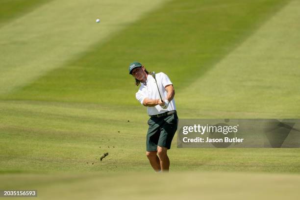 Kristoffer Broberg of Sweden pitches onto the green on hole 7 during the third round of the International Series Oman at Al Mouj Golf on February 24,...