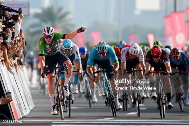 Tim Merlier of Belgium and Team Soudal-Quick Step - Green points jersey celebrates at finish line as stage winner during the 6th UAE Tour 2024, Stage...