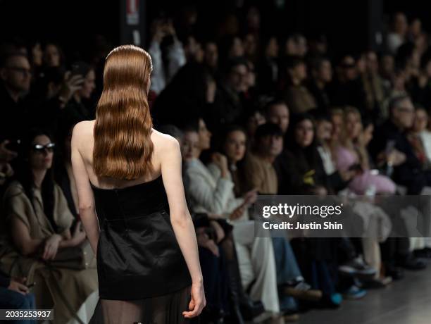 Model, bag detail, walks the runway at the Ermanno Scervino fashion show during the Milan Fashion Week Womenswear Fall/Winter 2024-2025 on February...