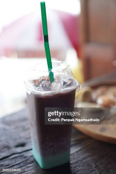 chocolate milk mint ice in plastic cup - tubules stock pictures, royalty-free photos & images