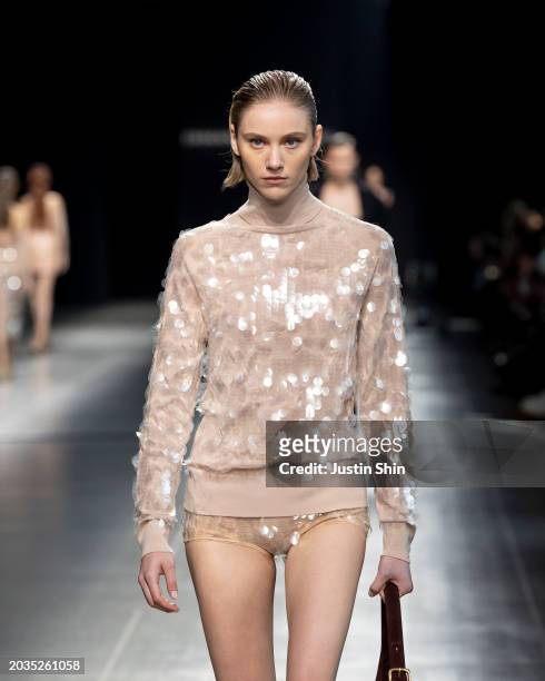 Model walks the runway at the Ermanno Scervino fashion show during the Milan Fashion Week Womenswear Fall/Winter 2024-2025 on February 24, 2024 in...