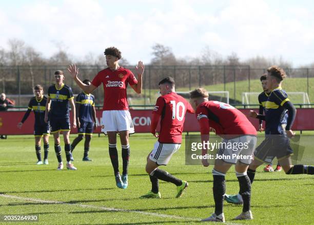 James Scanlon of Manchester United scores his sides first goal during the U18 Premier League match between Manchester United and Middlesbrough at...