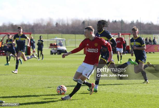 Ashton Missin of Manchester United scores his sides second goal during the U18 Premier League match between Manchester United and Middlesbrough at...
