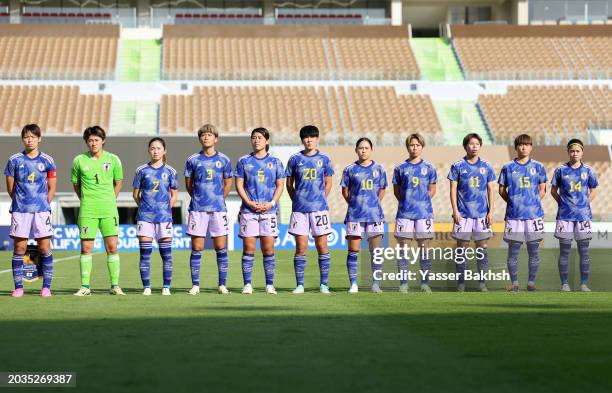 Players of Japan line up for the National Anthems prior to during the AFC Women's Olympic Football Tournament Paris 2024 Asian Final Qualifier first...