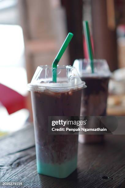 chocolate milk mint ice in plastic cup - tubules stock pictures, royalty-free photos & images