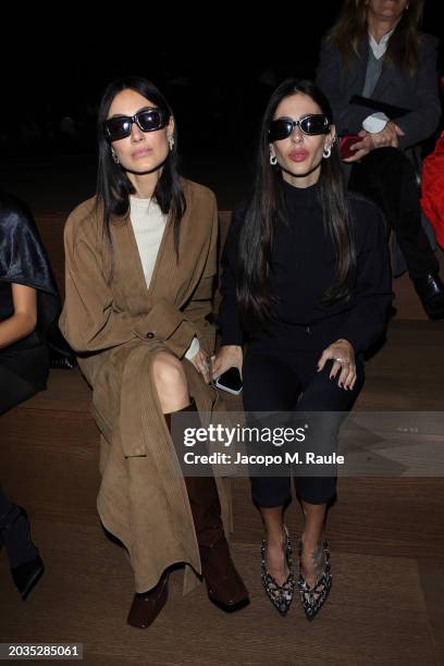 Giorgia Tordini and Gilda Ambrosio attend the Ferragamo Fall Winter 2024 fashion show during the Milan Fashion Week Womenswear Fall/Winter 2024-2025...