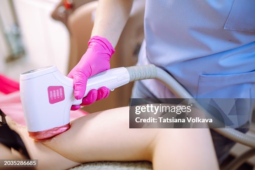 Doctor's hand holding laser finishing work with armpit. Doctor's hand holding laser finishing work with armpit.